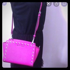 Authentic Michael Kors Fuscia Selma Medium bag.